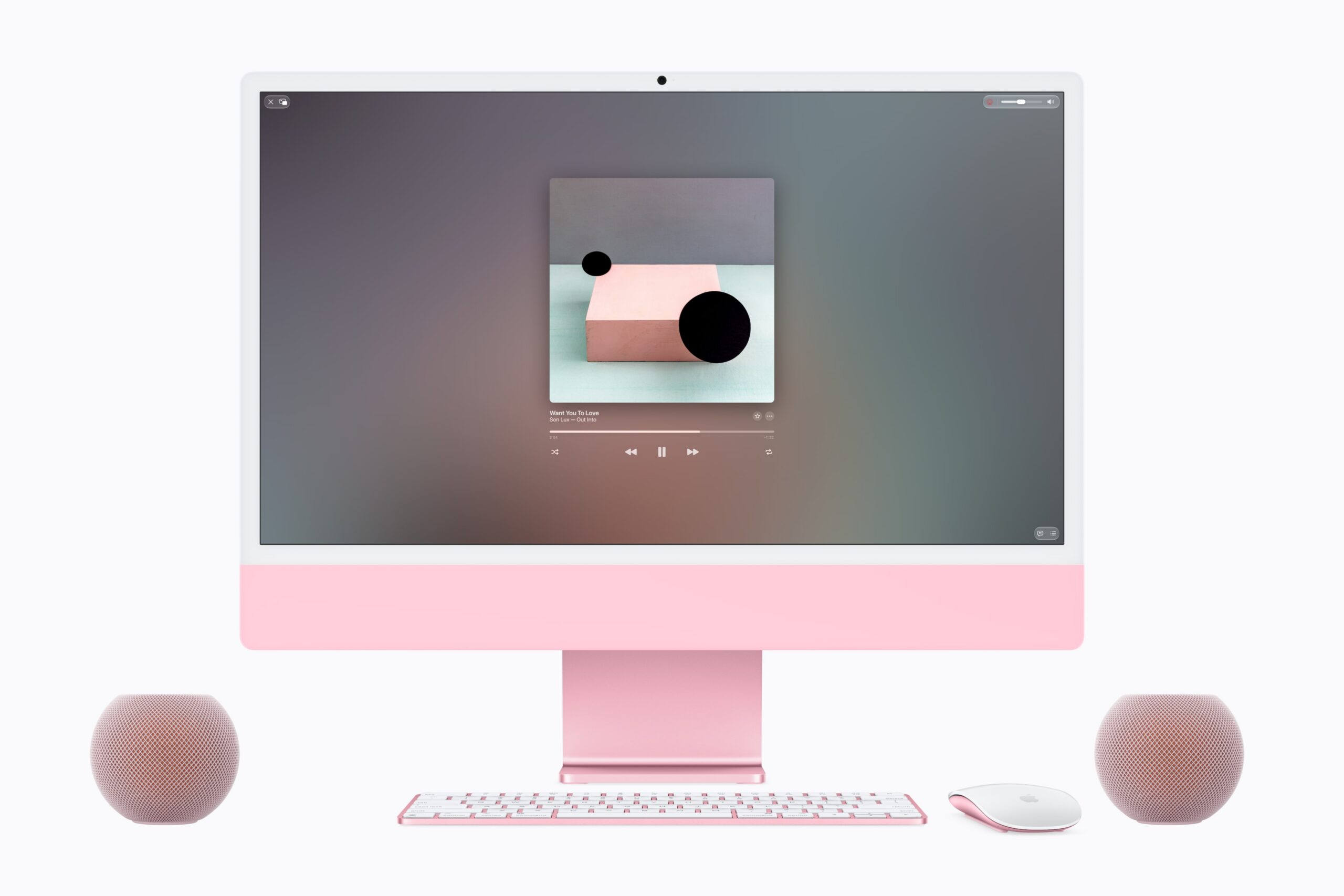 粉紅色 HomePod mini 2 搭配 iMac 桌面